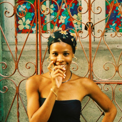 YOUNG WOMAN IN OLD HAVANA